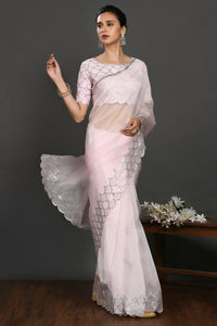 Buy powder pink stone and sequin work organza sari online in USA. Make a fashion statement on festive occasions and weddings with designer sarees, designer suits, Indian dresses, Anarkali suits, palazzo suits, designer gowns, sharara suits, embroidered sarees from Pure Elegance Indian fashion store in USA.-full view