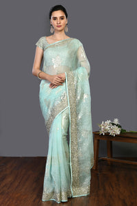 Buy mint green cutdana and stonework organza saree online in USA. Make a fashion statement on festive occasions and weddings with designer sarees, designer suits, Indian dresses, Anarkali suits, palazzo suits, designer gowns, sharara suits, embroidered sarees from Pure Elegance Indian fashion store in USA.-full view