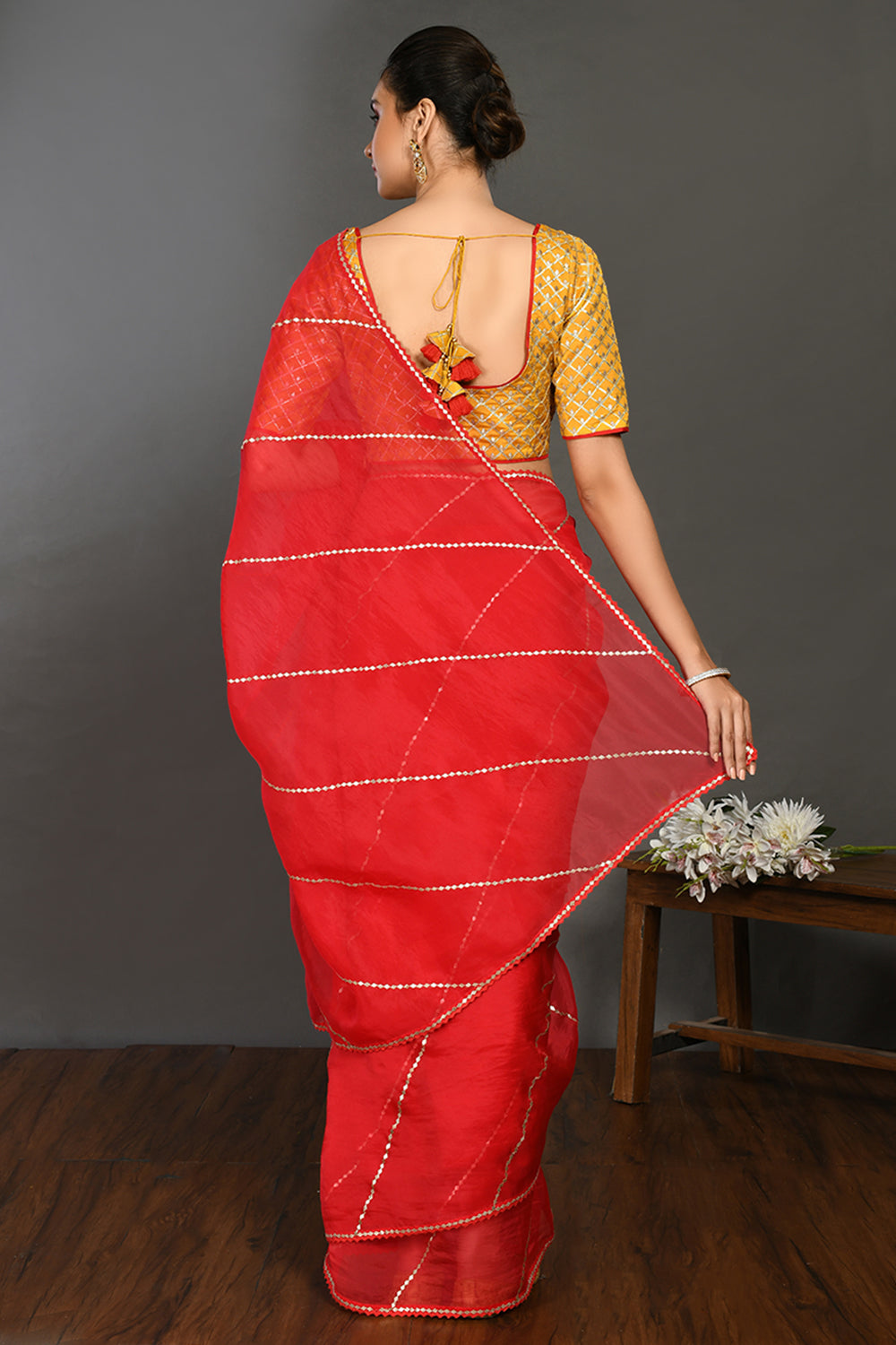 Buy red gota work saree online in USA with embroidered yellow blouse. Make a fashion statement on festive occasions and weddings with designer sarees, designer suits, Indian dresses, Anarkali suits, palazzo suits, designer gowns, sharara suits, embroidered sarees from Pure Elegance Indian fashion store in USA.-back