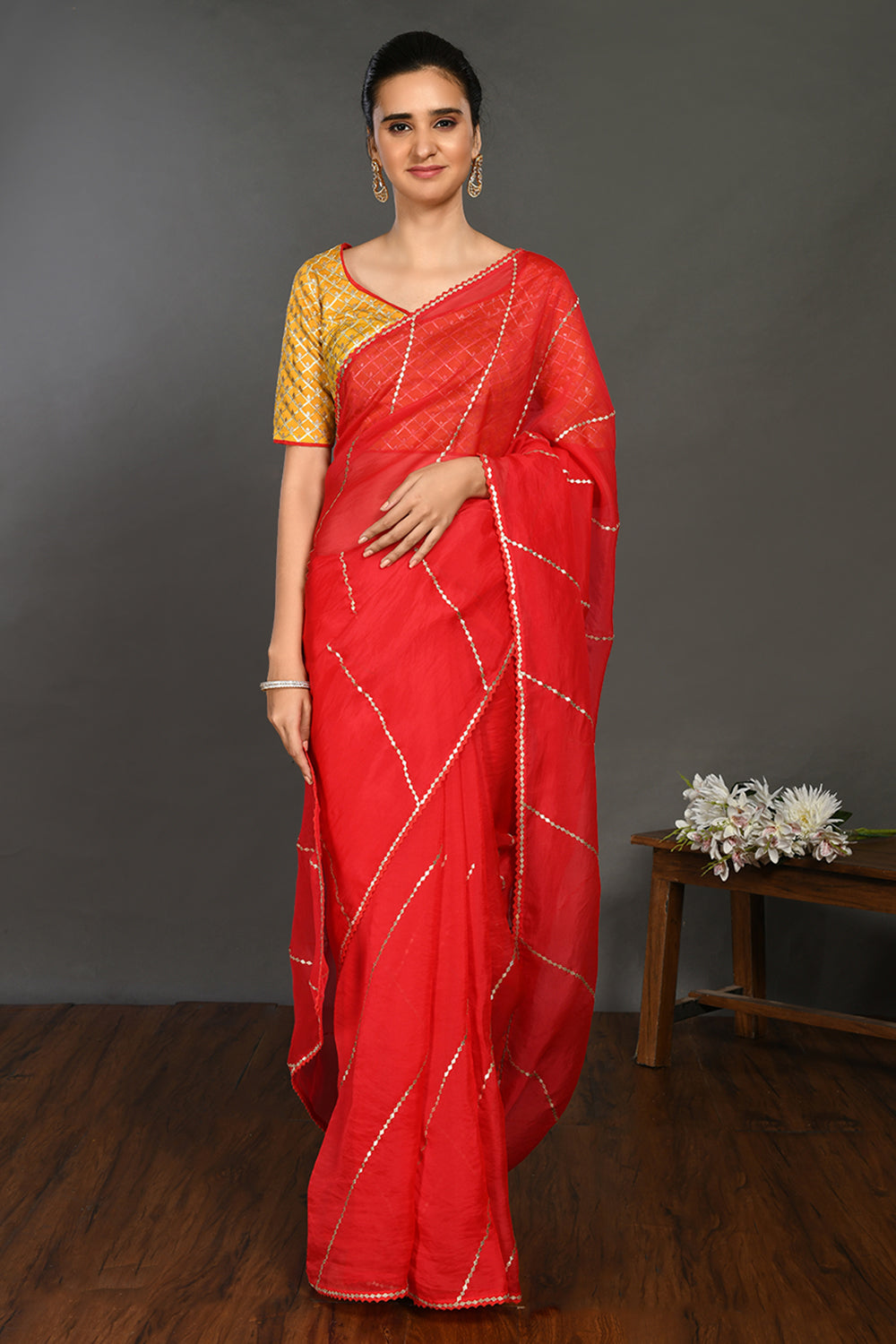 Buy red gota work saree online in USA with embroidered yellow blouse. Make a fashion statement on festive occasions and weddings with designer sarees, designer suits, Indian dresses, Anarkali suits, palazzo suits, designer gowns, sharara suits, embroidered sarees from Pure Elegance Indian fashion store in USA.-full view