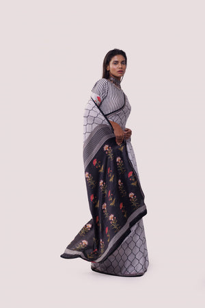 Shop white and black printed handloom saree online in USA with blouse. Make a fashion statement on festive occasions and weddings with designer sarees, designer suits, Indian dresses, Anarkali suits, palazzo suits, designer gowns, sharara suits, embroidered sarees from Pure Elegance Indian fashion store in USA.-right