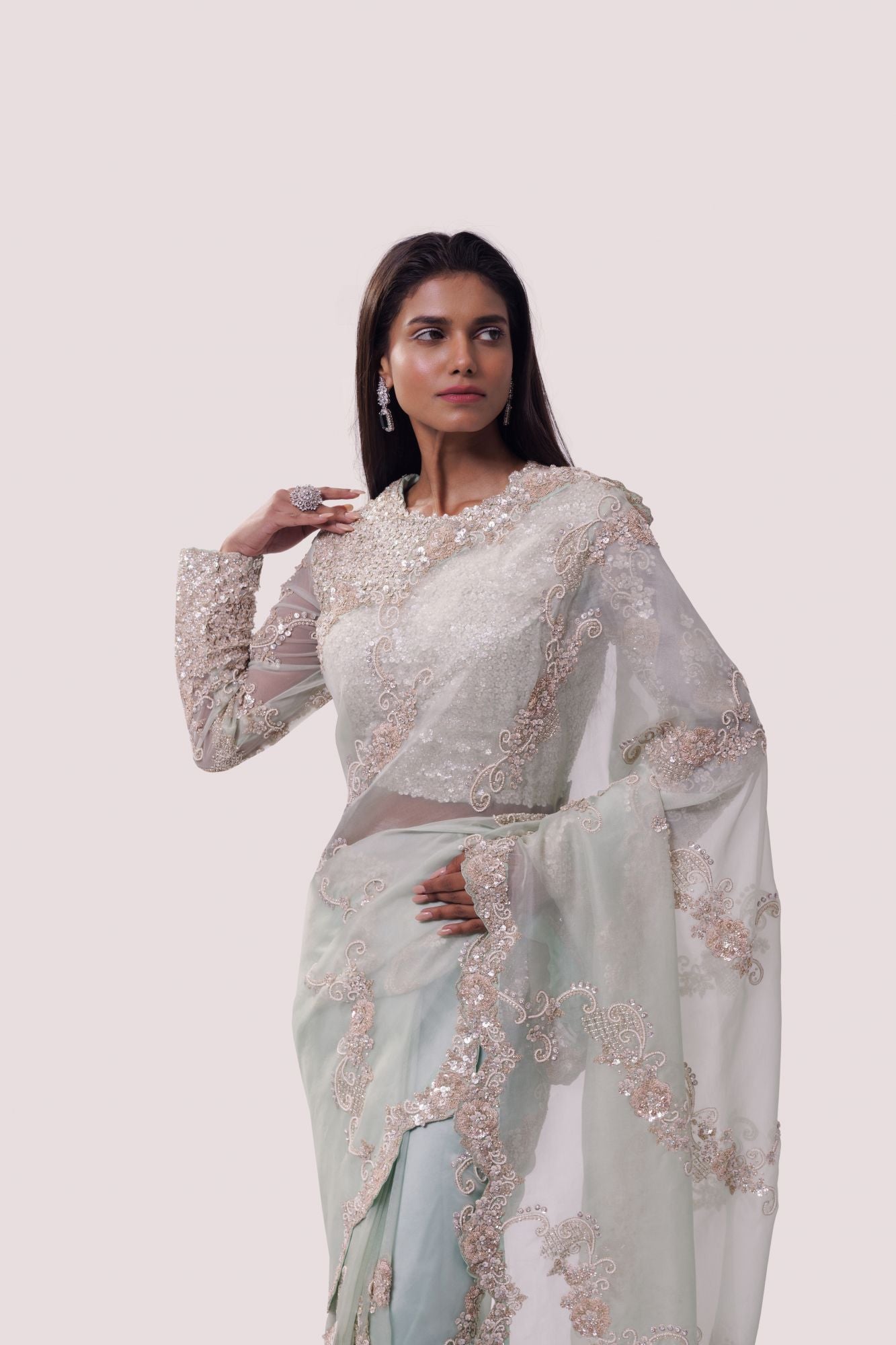 Buy mint green embroidered organza saree online in USA with blouse. Make a fashion statement on festive occasions and weddings with designer sarees, designer suits, Indian dresses, Anarkali suits, palazzo suits, designer gowns, sharara suits, embroidered sarees from Pure Elegance Indian fashion store in USA.-closeup