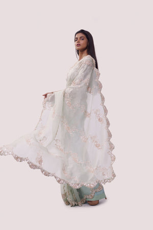 Buy mint green embroidered organza saree online in USA with blouse. Make a fashion statement on festive occasions and weddings with designer sarees, designer suits, Indian dresses, Anarkali suits, palazzo suits, designer gowns, sharara suits, embroidered sarees from Pure Elegance Indian fashion store in USA.-pallu