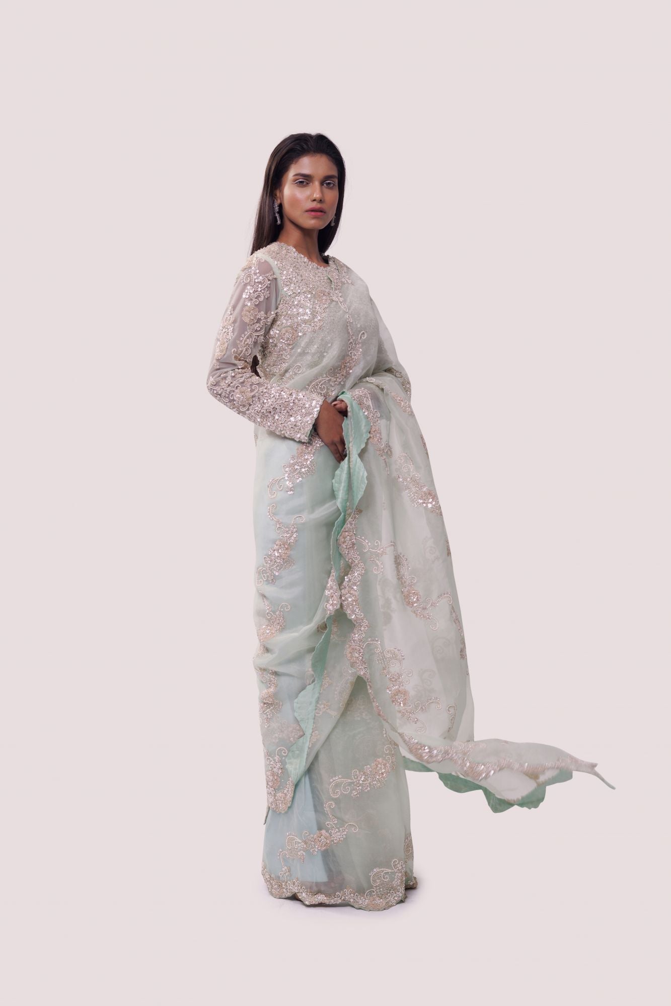 Buy mint green embroidered organza saree online in USA with blouse. Make a fashion statement on festive occasions and weddings with designer sarees, designer suits, Indian dresses, Anarkali suits, palazzo suits, designer gowns, sharara suits, embroidered sarees from Pure Elegance Indian fashion store in USA.-right
