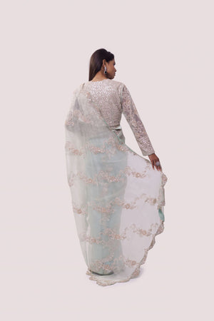 Buy mint green embroidered organza saree online in USA with blouse. Make a fashion statement on festive occasions and weddings with designer sarees, designer suits, Indian dresses, Anarkali suits, palazzo suits, designer gowns, sharara suits, embroidered sarees from Pure Elegance Indian fashion store in USA.-back