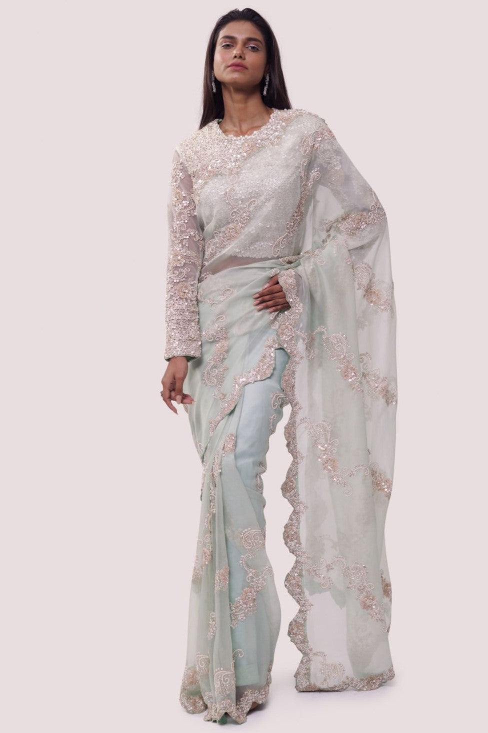 Buy mint green embroidered organza saree online in USA with blouse. Make a fashion statement on festive occasions and weddings with designer sarees, designer suits, Indian dresses, Anarkali suits, palazzo suits, designer gowns, sharara suits, embroidered sarees from Pure Elegance Indian fashion store in USA.-full view