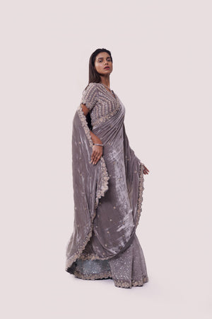 Shop grey embroidered organza and velvet saree online in USA with blouse. Make a fashion statement on festive occasions and weddings with designer sarees, designer suits, Indian dresses, Anarkali suits, palazzo suits, designer gowns, sharara suits, embroidered sarees from Pure Elegance Indian fashion store in USA.-right