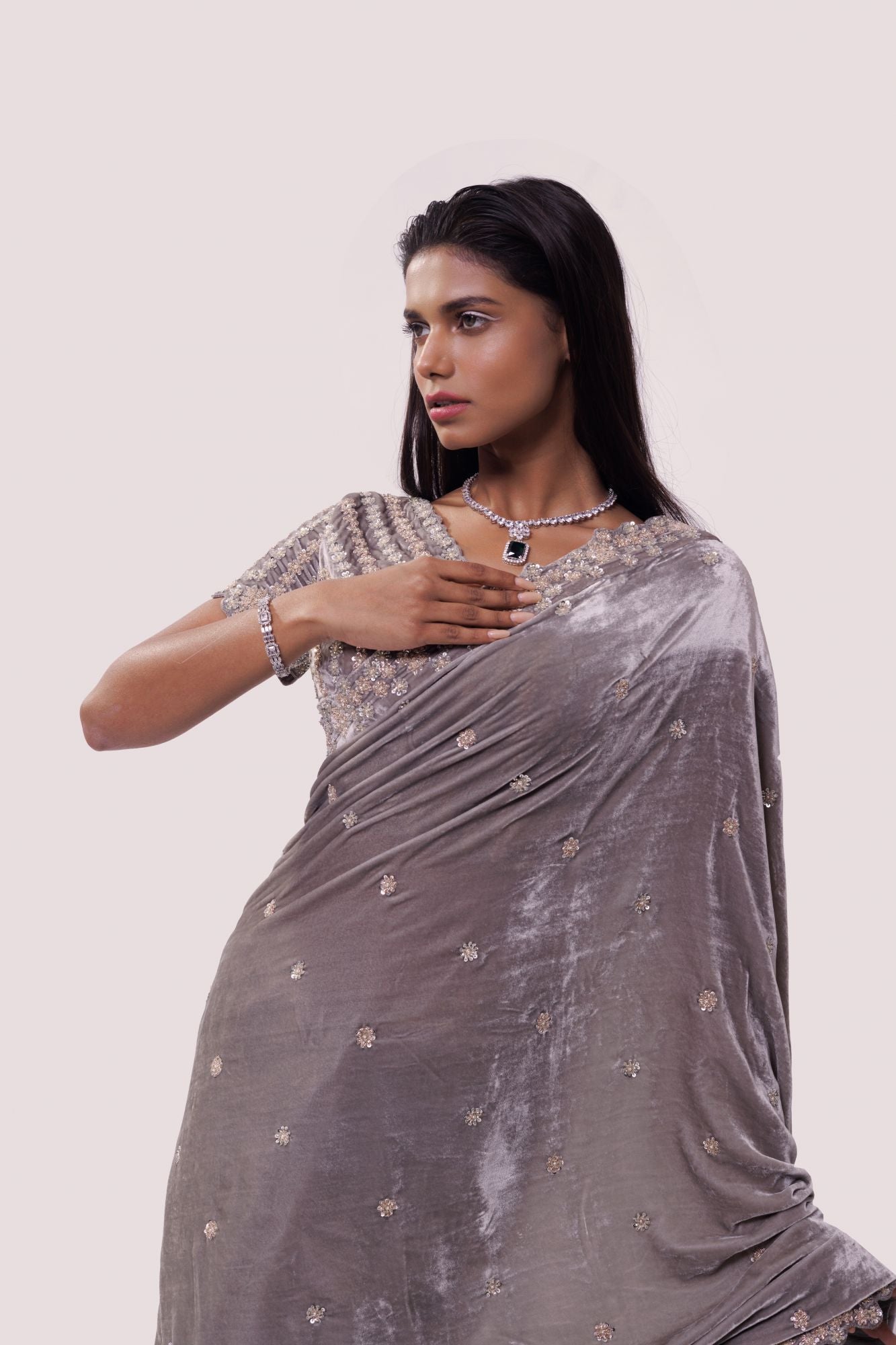 Shop grey embroidered organza and velvet saree online in USA with blouse. Make a fashion statement on festive occasions and weddings with designer sarees, designer suits, Indian dresses, Anarkali suits, palazzo suits, designer gowns, sharara suits, embroidered sarees from Pure Elegance Indian fashion store in USA.-closeup