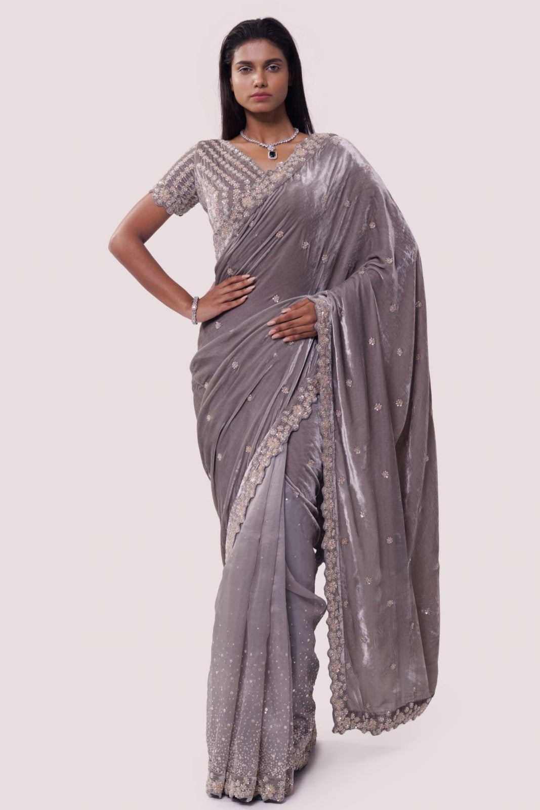 Shop grey embroidered organza and velvet saree online in USA with blouse. Make a fashion statement on festive occasions and weddings with designer sarees, designer suits, Indian dresses, Anarkali suits, palazzo suits, designer gowns, sharara suits, embroidered sarees from Pure Elegance Indian fashion store in USA.-full view