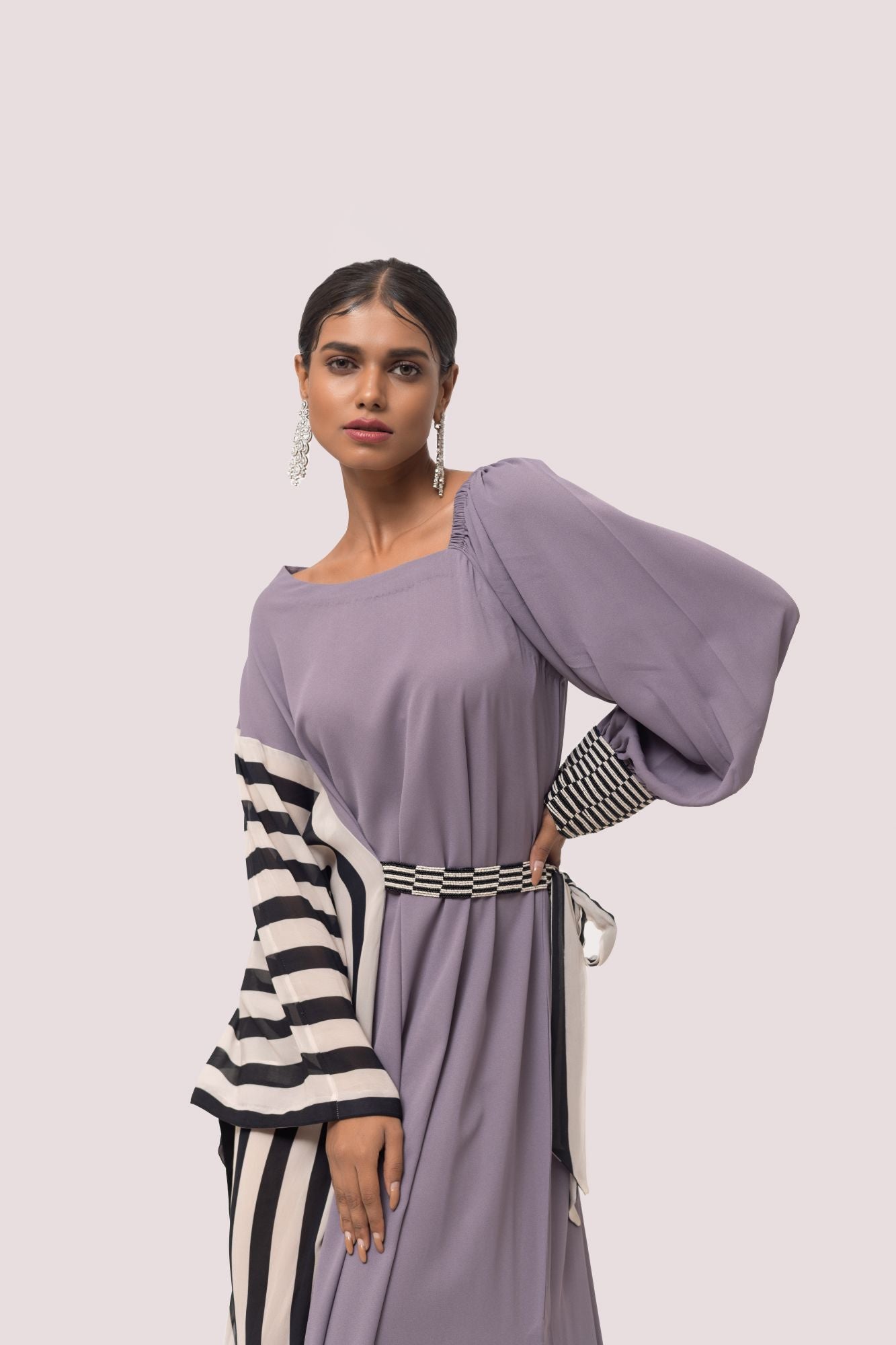 Buy grey pearl embroidery gown online in USA with oversized striped sleeves. Make a fashion statement on festive occasions and weddings with designer sarees, designer suits, Indian dresses, Anarkali suits, palazzo suits, designer gowns, sharara suits, embroidered sarees from Pure Elegance Indian fashion store in USA.-closeup