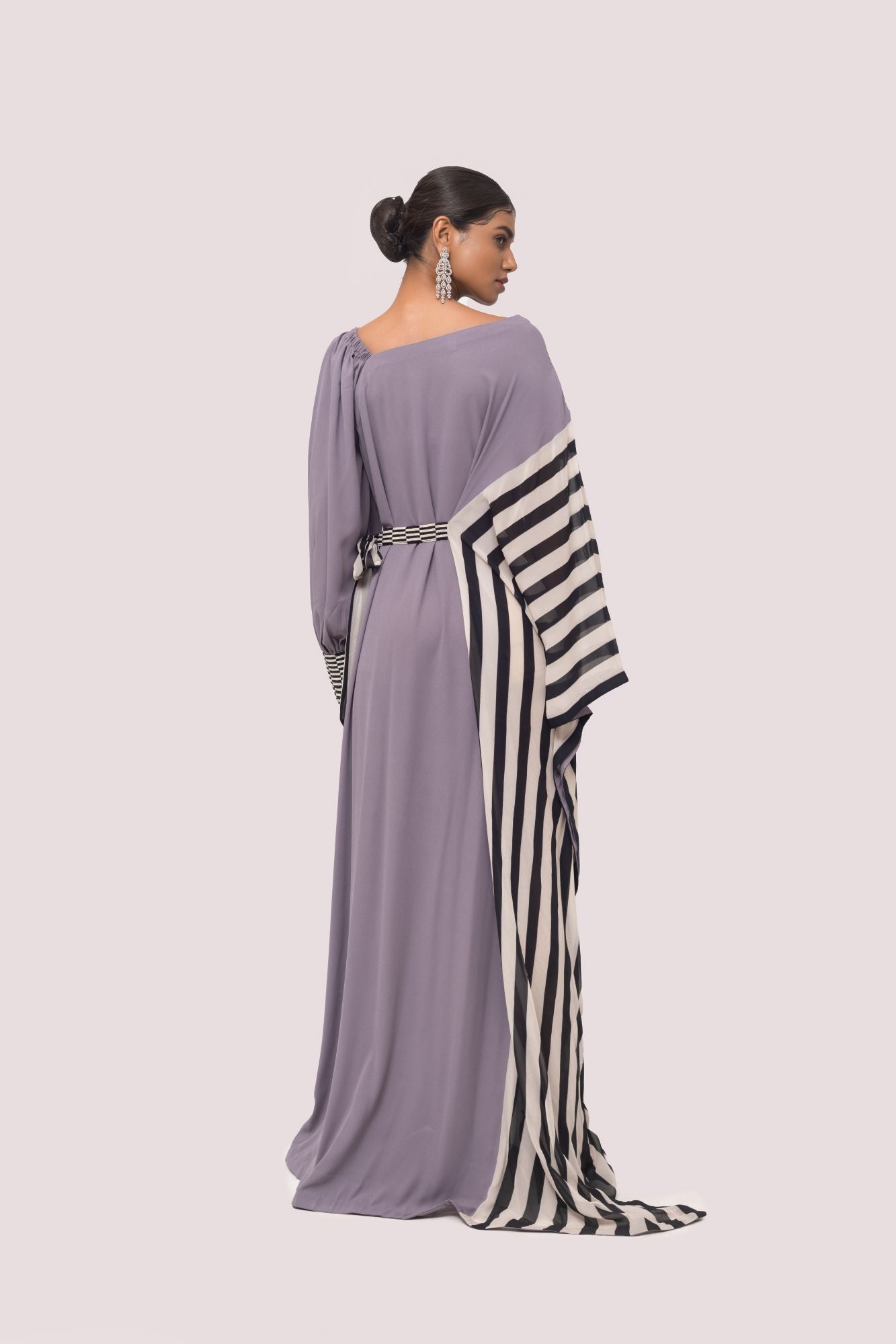 Buy grey pearl embroidery gown online in USA with oversized striped sleeves. Make a fashion statement on festive occasions and weddings with designer sarees, designer suits, Indian dresses, Anarkali suits, palazzo suits, designer gowns, sharara suits, embroidered sarees from Pure Elegance Indian fashion store in USA.-back