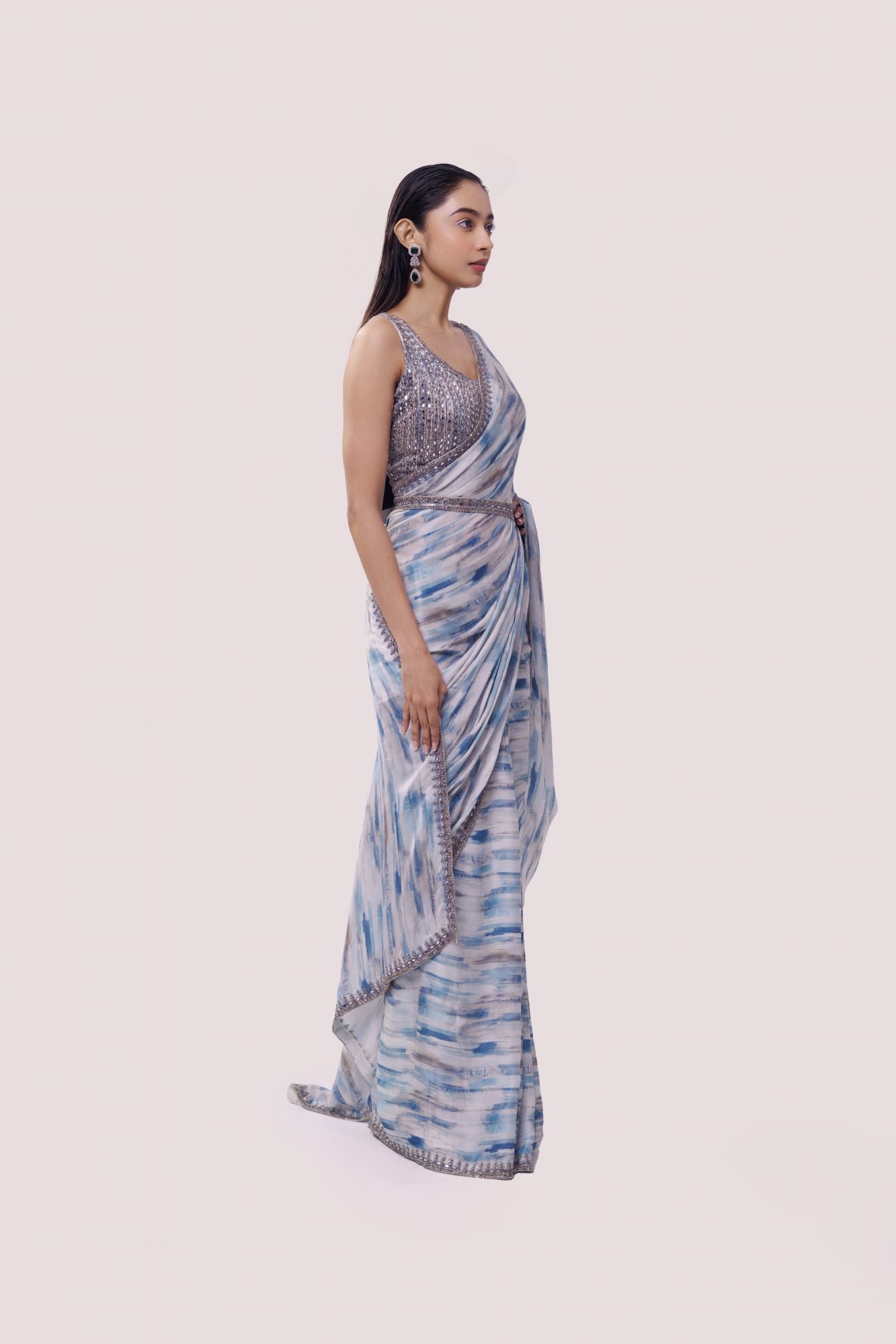 Buy white and blue embroidered satin saree online in USA with blouse. Make a fashion statement on festive occasions and weddings with designer sarees, designer suits, Indian dresses, Anarkali suits, palazzo suits, designer gowns, sharara suits, embroidered sarees from Pure Elegance Indian fashion store in USA.-side