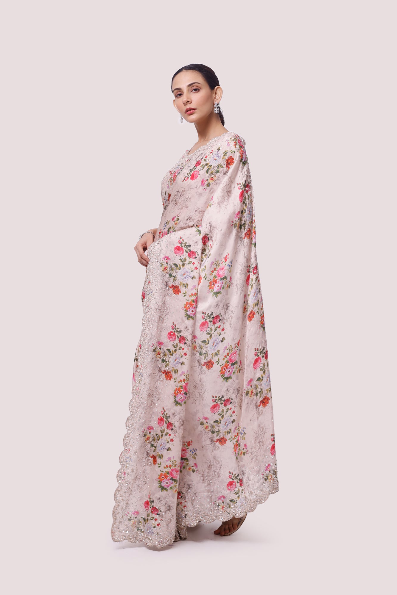 Shop beige floral print satin saree online in USA with saree blouse. Make a fashion statement on festive occasions and weddings with designer sarees, designer suits, Indian dresses, Anarkali suits, palazzo suits, designer gowns, sharara suits, embroidered sarees from Pure Elegance Indian fashion store in USA.-pallu