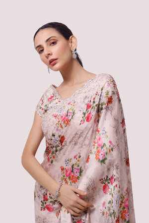 Shop beige floral print satin saree online in USA with saree blouse. Make a fashion statement on festive occasions and weddings with designer sarees, designer suits, Indian dresses, Anarkali suits, palazzo suits, designer gowns, sharara suits, embroidered sarees from Pure Elegance Indian fashion store in USA.-closeup