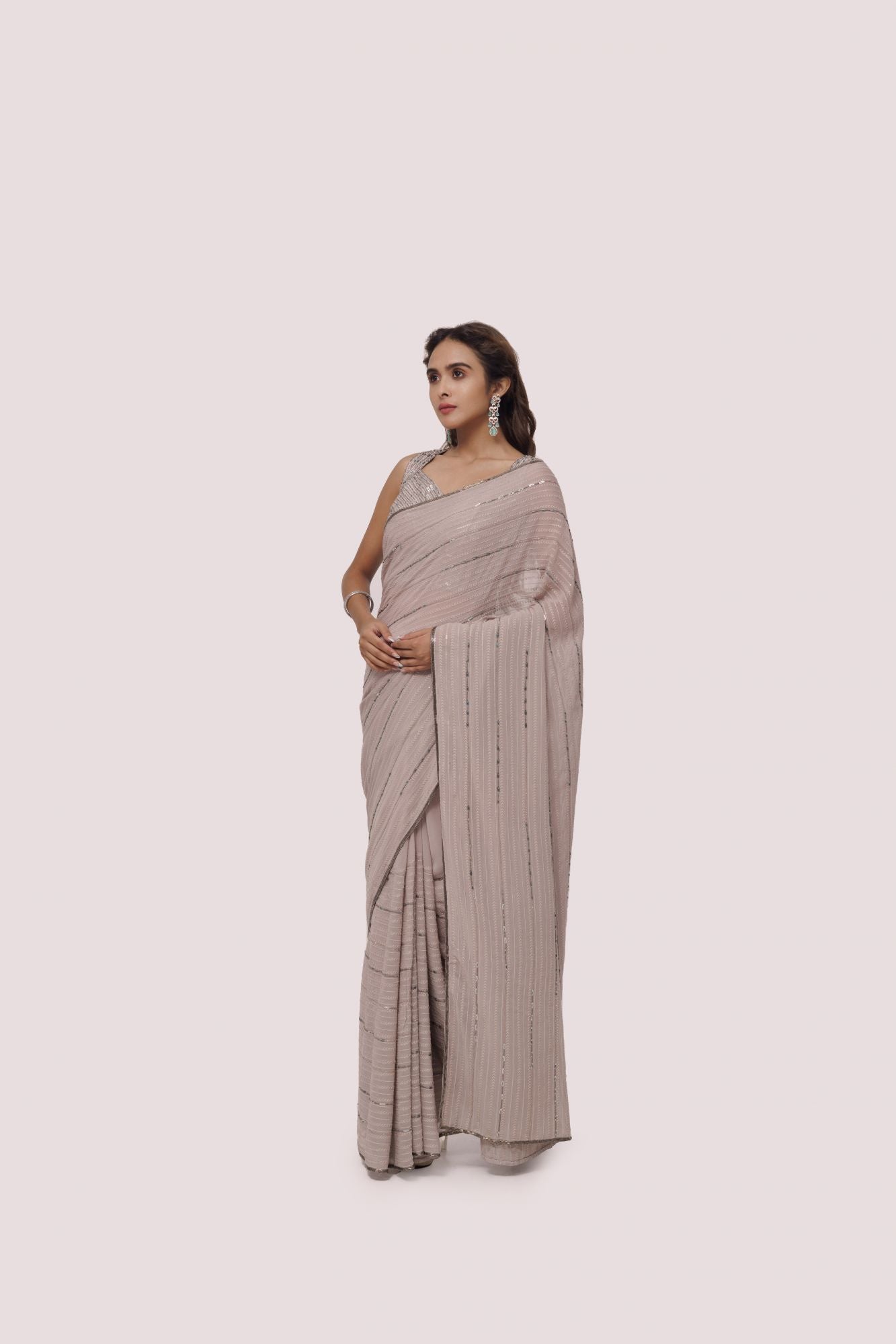 Buy steel grey sequin and cutdana work chikan saree online in USA with blouse. Make a fashion statement on festive occasions and weddings with designer sarees, designer suits, Indian dresses, Anarkali suits, palazzo suits, designer gowns, sharara suits, embroidered sarees from Pure Elegance Indian fashion store in USA.-pallu