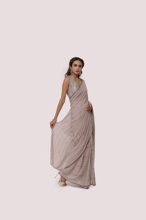 Buy steel grey sequin and cutdana work chikan saree online in USA with blouse. Make a fashion statement on festive occasions and weddings with designer sarees, designer suits, Indian dresses, Anarkali suits, palazzo suits, designer gowns, sharara suits, embroidered sarees from Pure Elegance Indian fashion store in USA.-right