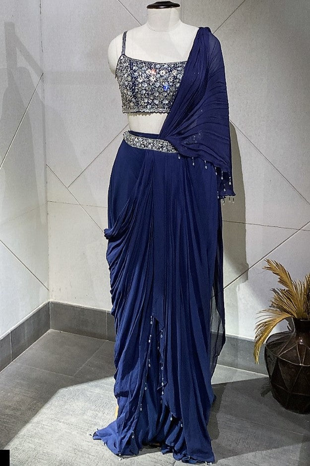 Buy a Beautiful navy embroidered belted organza sari with cut dana and tikki work. It comes with a designer embroidered saree blouse and a saree belt. Shop designer saris online in the USA from Pure Elegance. Make a fashion statement on festive occasions and weddings with designer sarees, designer suits, Indian dresses, Anarkali suits, palazzo suits, designer gowns, sharara suits, and embroidered sarees from Pure Elegance Indian fashion store in the USA.
