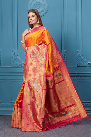 Buy orange Gadhwal silk saree online in USA with pink golden zari border. Look your best on festive occasions in latest designer sarees, pure silk saris, Kanchipuram silk sarees, handwoven sarees, tussar silk sarees, embroidered saris from Pure Elegance Indian clothing store in USA.-pallu