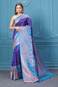 Shop royal blue Gadhwal silk saree online in USA with antique golden border. Look your best on festive occasions in latest designer sarees, pure silk saris, Kanchipuram silk sarees, handwoven sarees, tussar silk sarees, embroidered saris from Pure Elegance Indian clothing store in USA.-full view