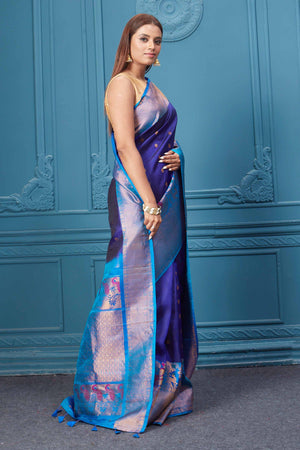 Shop royal blue Gadhwal silk saree online in USA with antique golden border. Look your best on festive occasions in latest designer sarees, pure silk saris, Kanchipuram silk sarees, handwoven sarees, tussar silk sarees, embroidered saris from Pure Elegance Indian clothing store in USA.-side