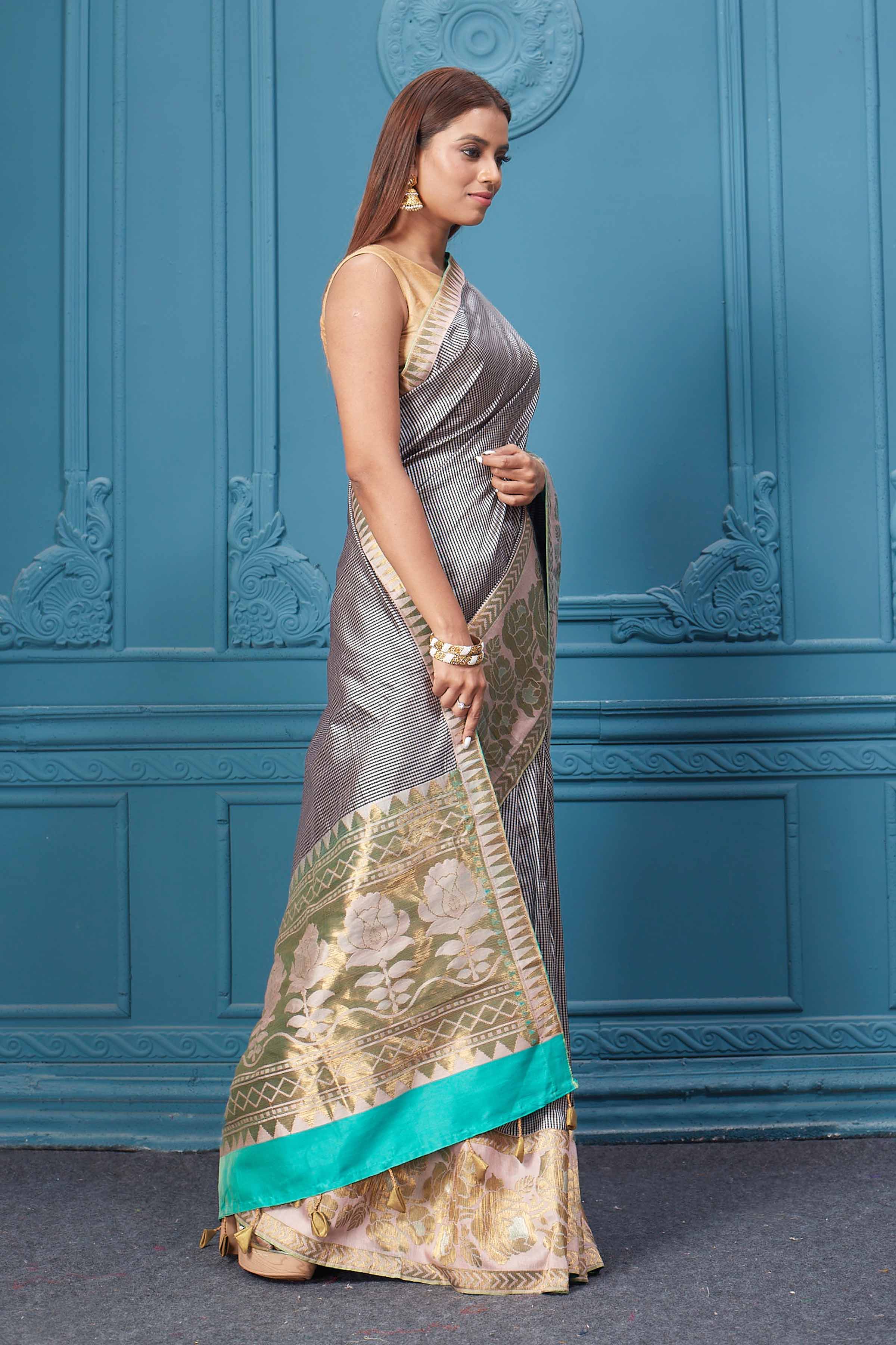 Buy beautiful white and black check Gadhwal silk saree online in USA with golden border. Look your best on festive occasions in latest designer sarees, pure silk saris, Kanchipuram silk sarees, handwoven sarees, tussar silk sarees, embroidered saris from Pure Elegance Indian clothing store in USA.-side