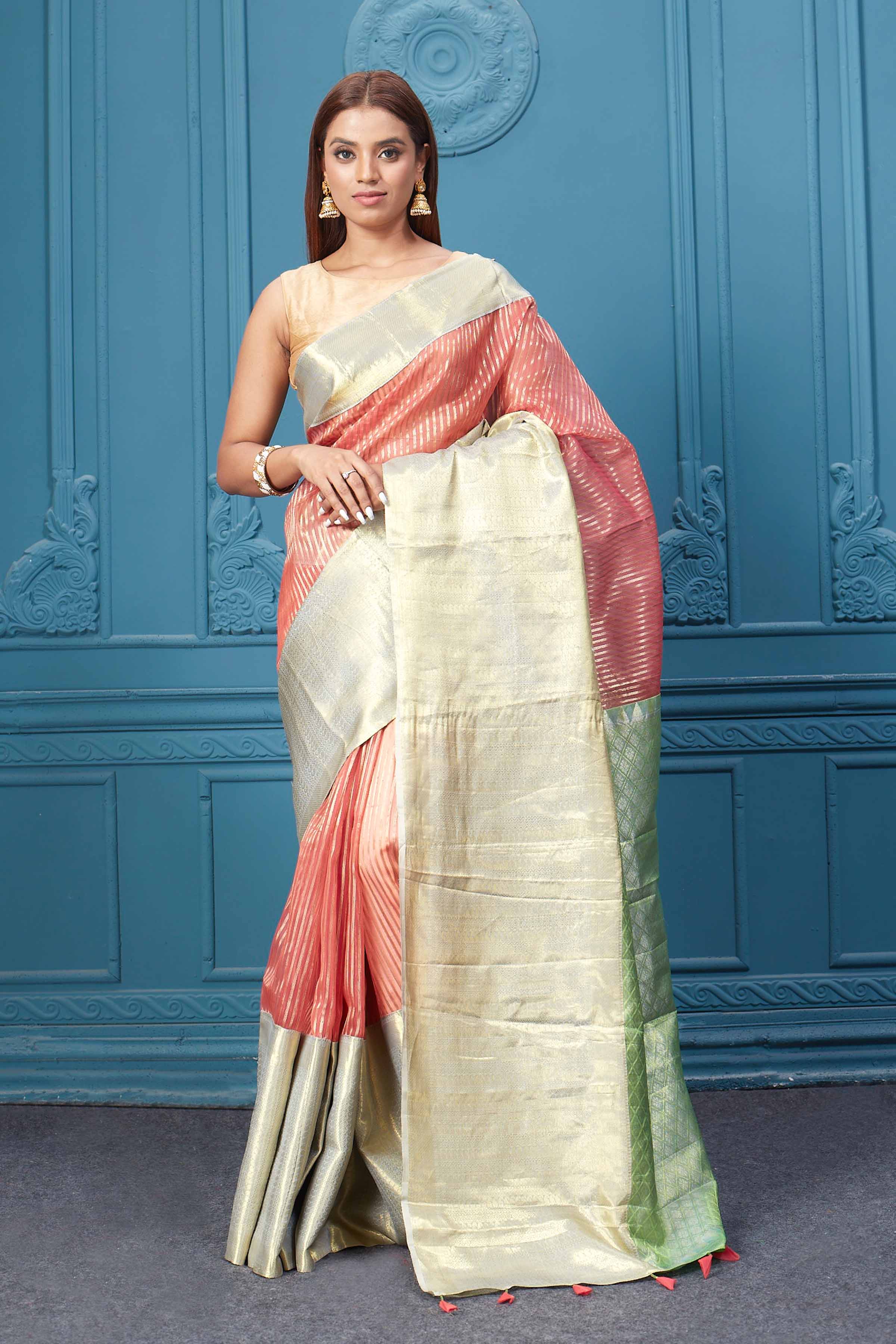Buy red striped Kora Kanjivaram sari online in USA with silver golden border. Look your best on festive occasions in latest designer sarees, pure silk saris, Kanchipuram silk sarees, handwoven sarees, tussar silk sarees, embroidered saris from Pure Elegance Indian clothing store in USA.-full view