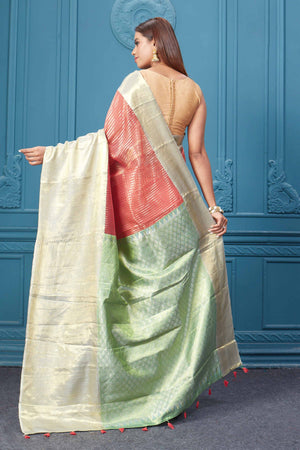Buy red striped Kora Kanjivaram sari online in USA with silver golden border. Look your best on festive occasions in latest designer sarees, pure silk saris, Kanchipuram silk sarees, handwoven sarees, tussar silk sarees, embroidered saris from Pure Elegance Indian clothing store in USA.-back