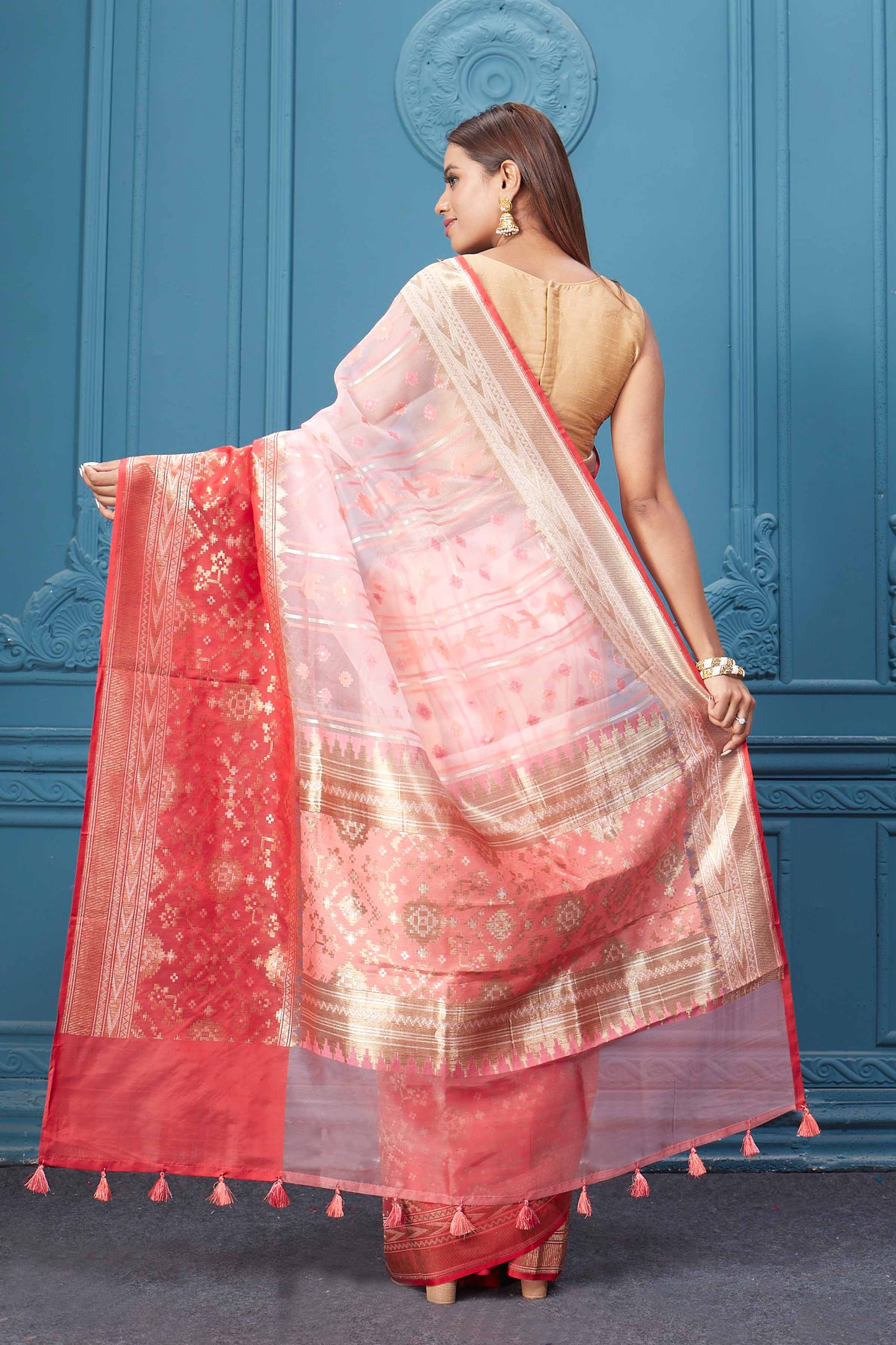 Shop powder pink fancy Kora sari online in USA with red border. Look your best on festive occasions in latest designer sarees, pure silk saris, Kanchipuram silk sarees, handwoven sarees, tussar silk sarees, embroidered saris from Pure Elegance Indian clothing store in USA.-back