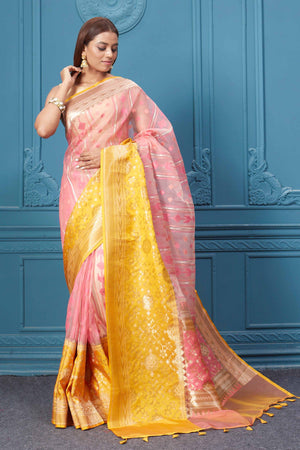 Shop pink fancy Kora sari online in USA with yellow border. Look your best on festive occasions in latest designer sarees, pure silk saris, Kanchipuram silk sarees, handwoven sarees, tussar silk sarees, embroidered saris from Pure Elegance Indian clothing store in USA.-front