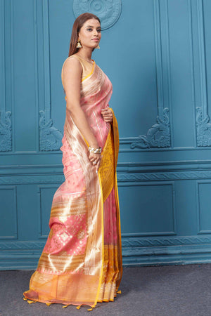 Shop pink fancy Kora sari online in USA with yellow border. Look your best on festive occasions in latest designer sarees, pure silk saris, Kanchipuram silk sarees, handwoven sarees, tussar silk sarees, embroidered saris from Pure Elegance Indian clothing store in USA.-side