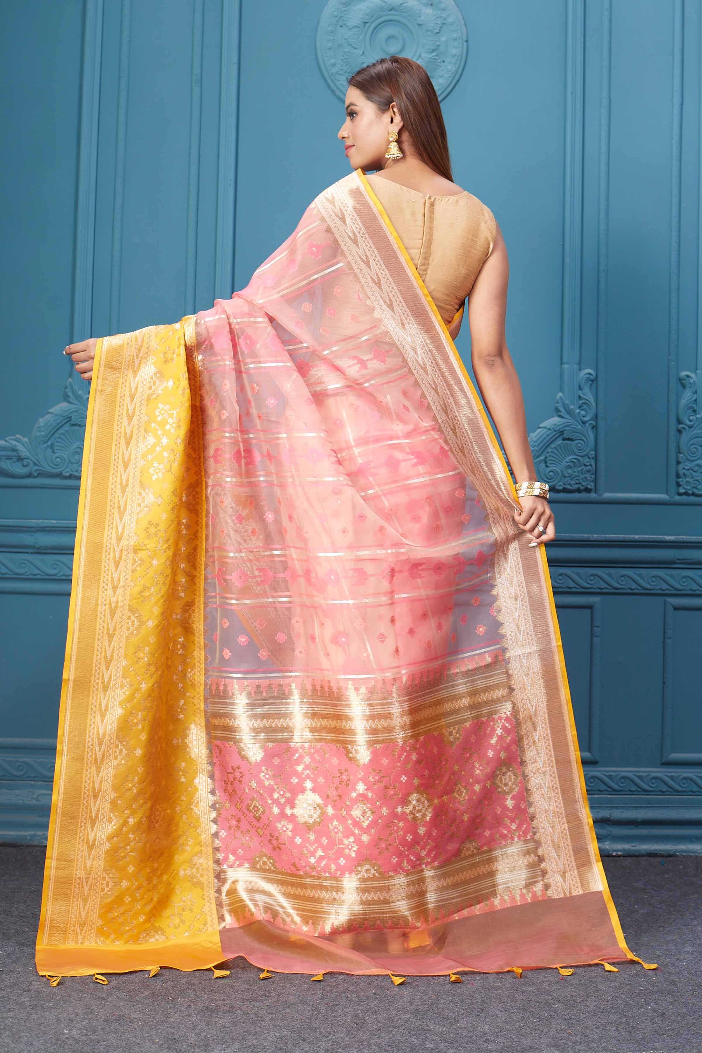 Shop pink fancy Kora sari online in USA with yellow border. Look your best on festive occasions in latest designer sarees, pure silk saris, Kanchipuram silk sarees, handwoven sarees, tussar silk sarees, embroidered saris from Pure Elegance Indian clothing store in USA.-back
