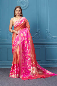 Shop red striped fancy Kora sari online in USA with pink floral border. Look your best on festive occasions in latest designer sarees, pure silk saris, Kanchipuram silk sarees, handwoven sarees, tussar silk sarees, embroidered saris from Pure Elegance Indian clothing store in USA.-full view