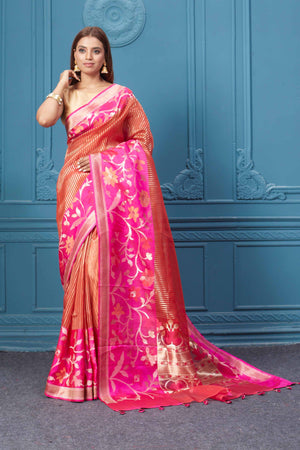 Shop red striped fancy Kora sari online in USA with pink floral border. Look your best on festive occasions in latest designer sarees, pure silk saris, Kanchipuram silk sarees, handwoven sarees, tussar silk sarees, embroidered saris from Pure Elegance Indian clothing store in USA.-pallu