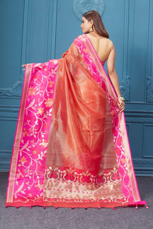 Shop red striped fancy Kora sari online in USA with pink floral border. Look your best on festive occasions in latest designer sarees, pure silk saris, Kanchipuram silk sarees, handwoven sarees, tussar silk sarees, embroidered saris from Pure Elegance Indian clothing store in USA.-back