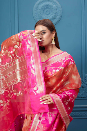 Shop red striped fancy Kora sari online in USA with pink floral border. Look your best on festive occasions in latest designer sarees, pure silk saris, Kanchipuram silk sarees, handwoven sarees, tussar silk sarees, embroidered saris from Pure Elegance Indian clothing store in USA.-closeup