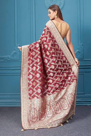Shop stunning maroon heavy Banarasi silk saree online in USA. Look royal at weddings and festive occasions in exquisite designer sarees, handwoven sarees, pure silk saris, Banarasi sarees, Kanchipuram silk sarees from Pure Elegance Indian saree store in USA. -back