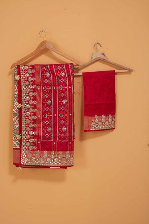 Buy off-white Patola silk saree online in USA with red embroidered border and saree blouse. Look royal at weddings and festive occasions in exquisite designer sarees, handwoven sarees, pure silk saris, Banarasi sarees, Kanchipuram silk sarees from Pure Elegance Indian saree store in USA. -blouse