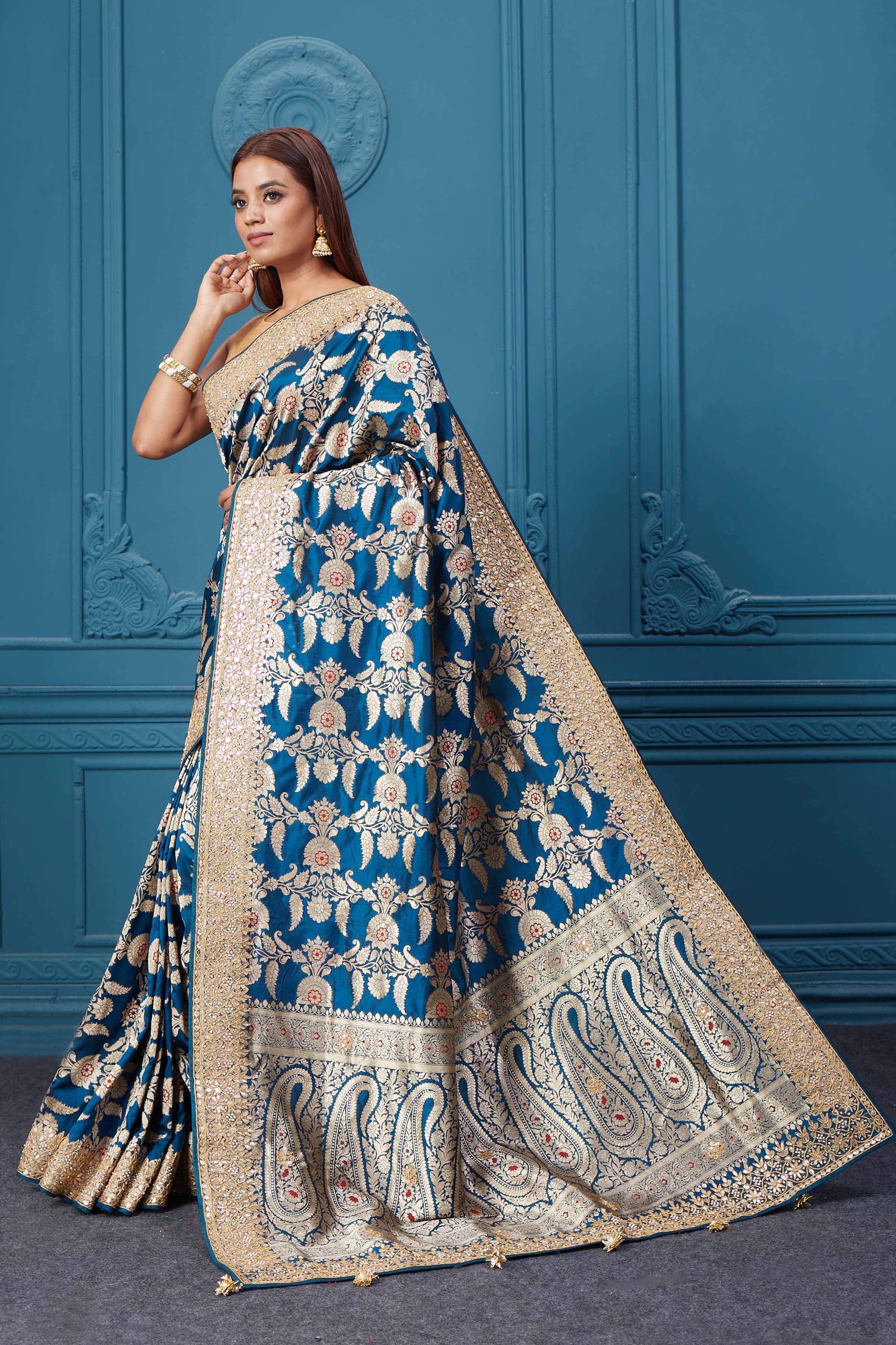 Buy sea blue Banarasi silk sari online in USA with zari minakari work. Look royal at weddings and festive occasions in exquisite designer sarees, handwoven sarees, pure silk saris, Banarasi sarees, Kanchipuram silk sarees from Pure Elegance Indian saree store in USA. -pallu