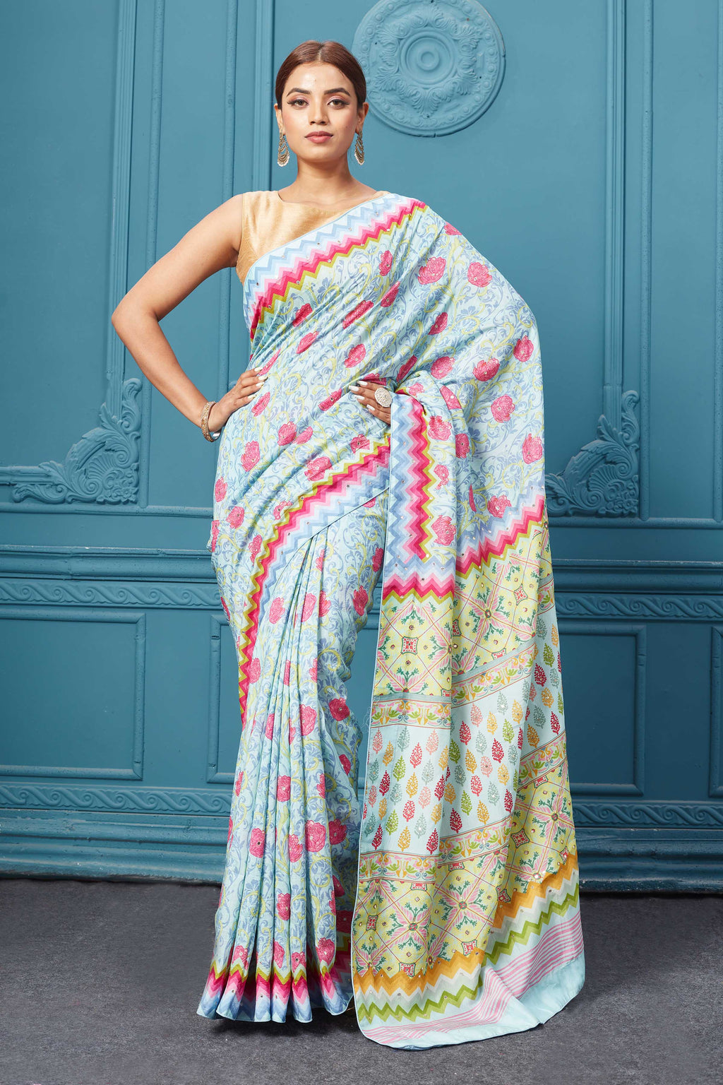 Shop powder blue floral embroidered mulberry silk saree online in USA. Look royal at weddings and festive occasions in exquisite designer sarees, handwoven sarees, pure silk saris, Banarasi sarees, Kanchipuram silk sarees from Pure Elegance Indian saree store in USA. -full view