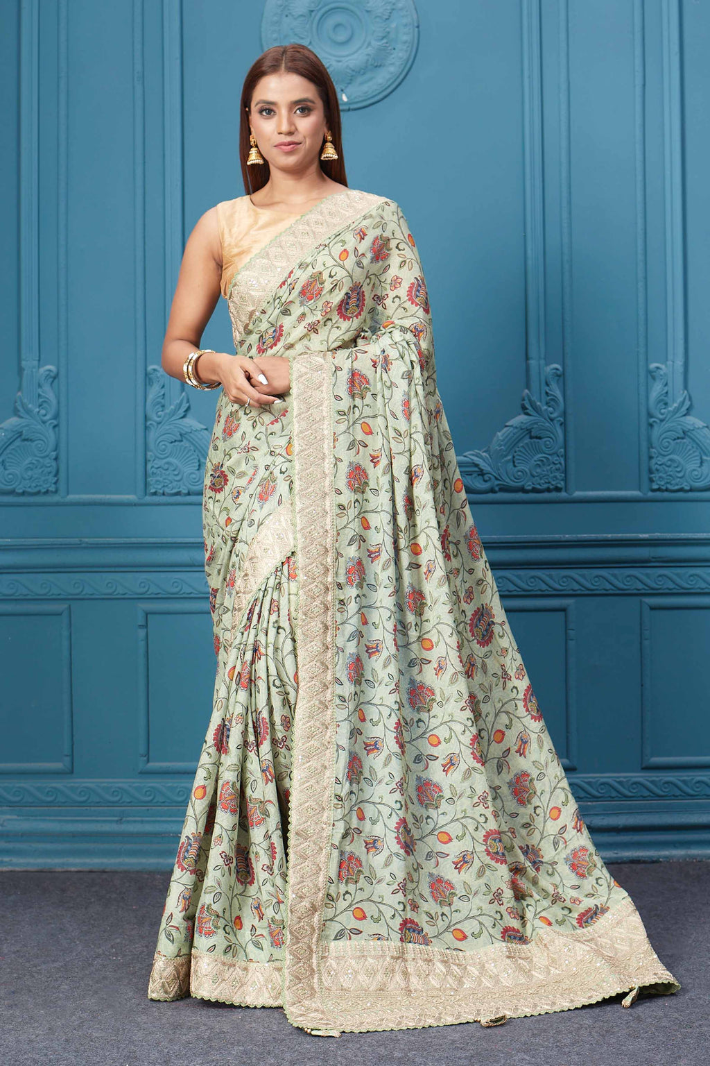 Buy sage green printed and embroidered crepe silk sari online in USA with saree blouse. Look royal at weddings and festive occasions in exquisite designer sarees, handwoven sarees, pure silk saris, Banarasi sarees, Kanchipuram silk sarees from Pure Elegance Indian saree store in USA. -full view