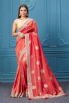 Shop red georgette saree online in USA with embroidered border. Look royal at weddings and festive occasions in exquisite designer sarees, handwoven sarees, pure silk saris, Banarasi sarees, Kanchipuram silk sarees from Pure Elegance Indian saree store in USA. -full view