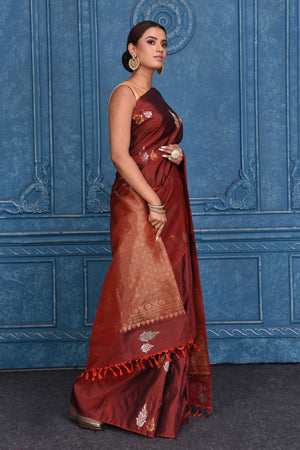 Shop maroon Kanchipuram silk sari online in USA with leaf zari buta. Keep your ethnic wardrobe up to date with latest designer saris, pure silk sarees, Kanchipuram silk sarees, handwoven silk sarees, tussar silk sarees, embroidered sarees from Pure Elegance Indian saree store in USA.-side