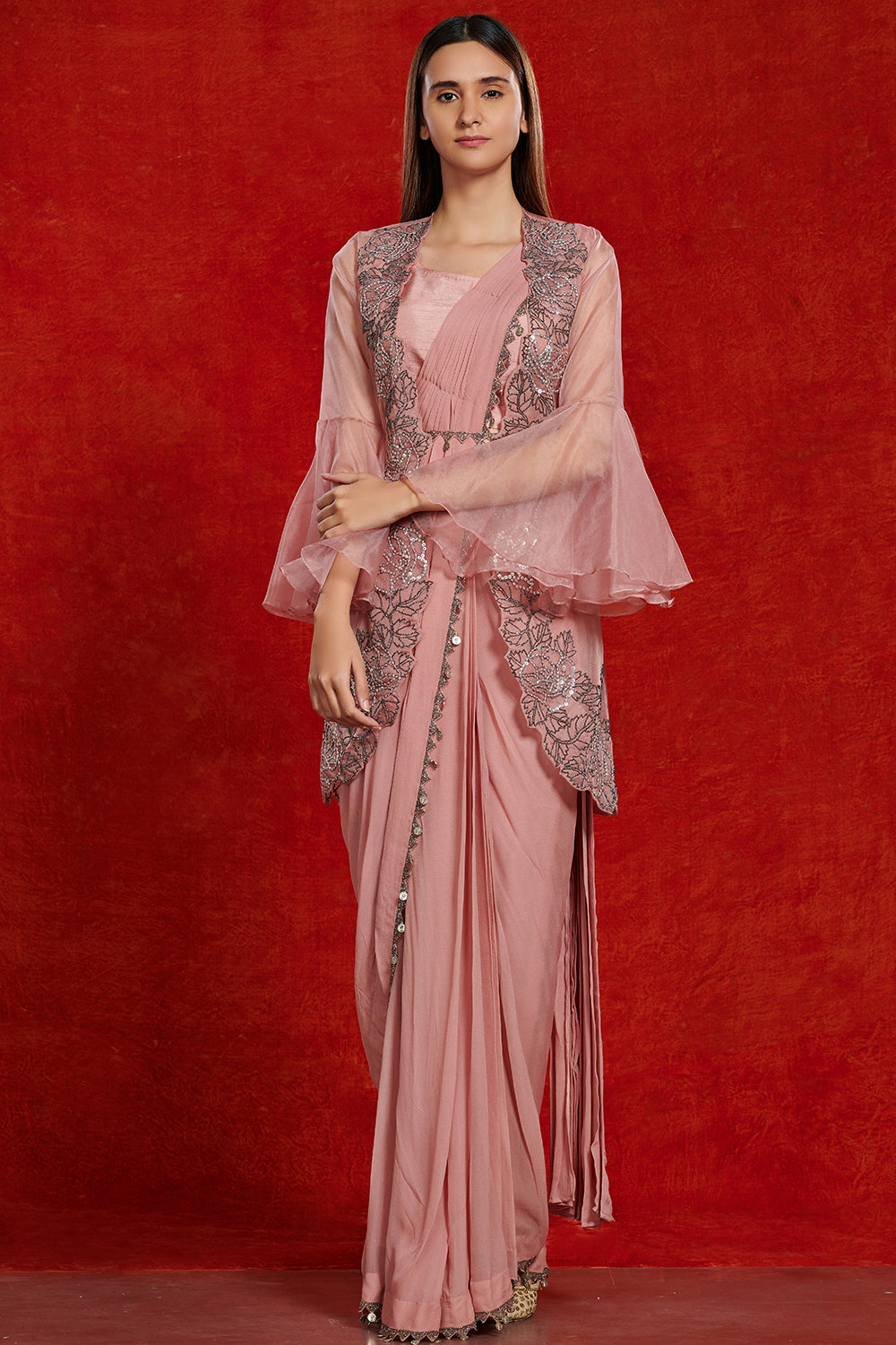 Buy beautiful blush pink fusion saree online in USA with attached jacket. Make a fashion statement on festive occasions and weddings with designer suits, Indian dresses, Anarkali suits, palazzo suits, designer gowns, sharara suits from Pure Elegance Indian fashion store in USA.-full view