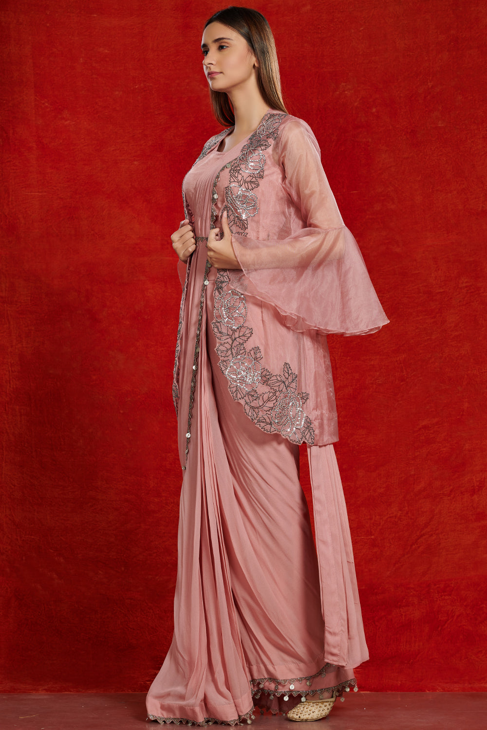 Buy beautiful blush pink fusion saree online in USA with attached jacket. Make a fashion statement on festive occasions and weddings with designer suits, Indian dresses, Anarkali suits, palazzo suits, designer gowns, sharara suits from Pure Elegance Indian fashion store in USA.-left