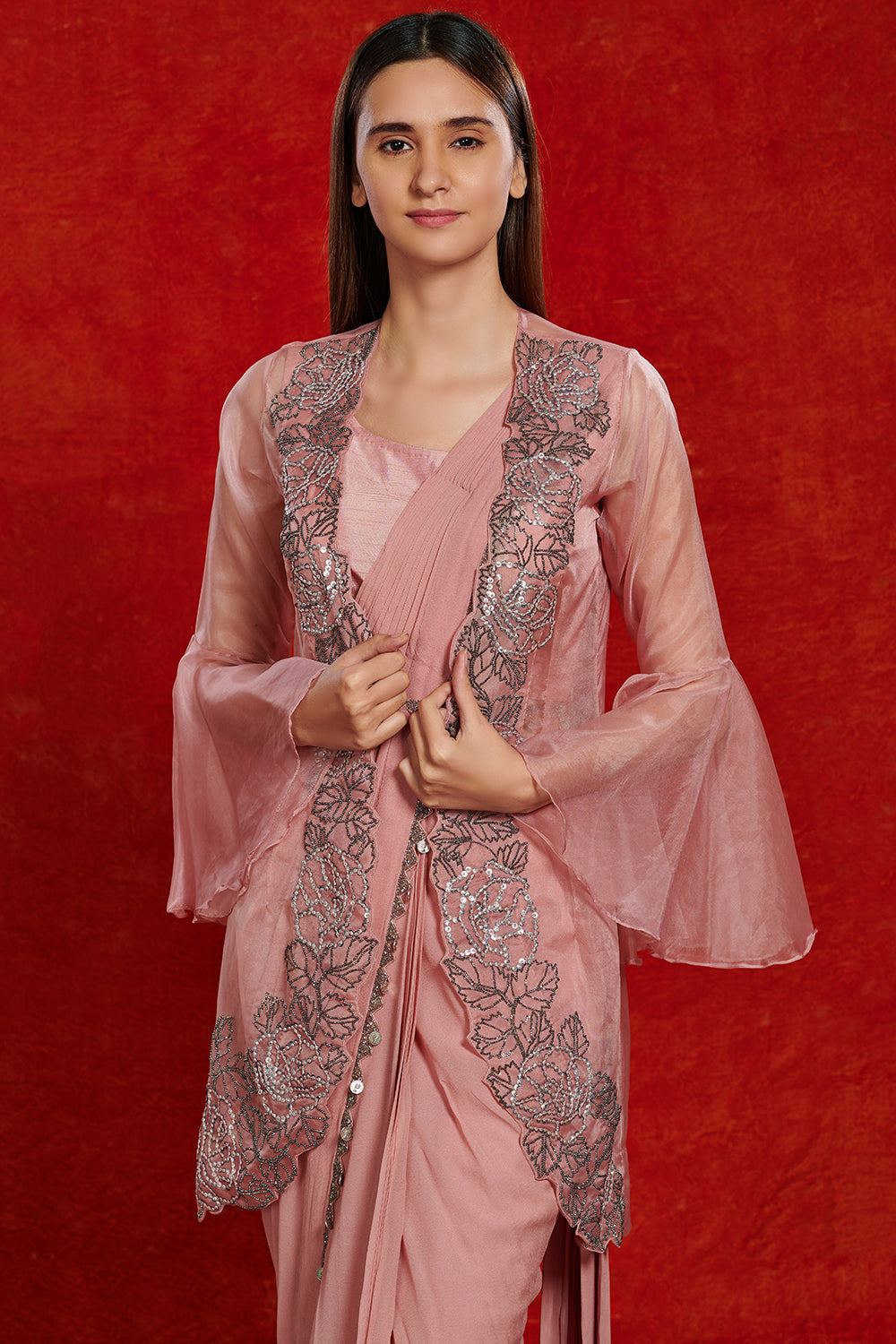 Buy beautiful blush pink fusion saree online in USA with attached jacket. Make a fashion statement on festive occasions and weddings with designer suits, Indian dresses, Anarkali suits, palazzo suits, designer gowns, sharara suits from Pure Elegance Indian fashion store in USA.-closeup