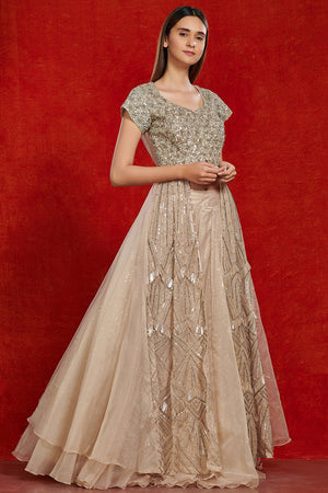 Buy stunning beige embellished lehenga online in USA. Make a fashion statement on festive occasions and weddings with designer suits, Indian dresses, Anarkali suits, palazzo suits, designer gowns, sharara suits from Pure Elegance Indian fashion store in USA.-right