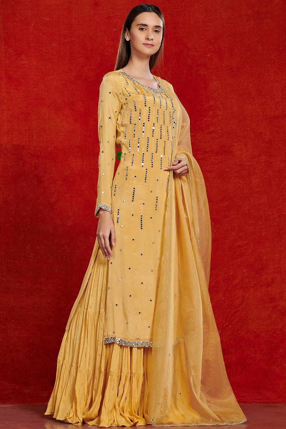 Shop stunning yellow mirror work chiffon sharara suit online in USA with dupatta. Make a fashion statement on festive occasions and weddings with palazzo suits, sharara suits, partywear dresses, salwar suits from Pure Elegance Indian fashion store in USA.-side