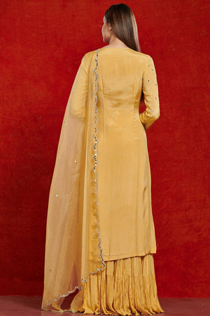 Shop stunning yellow mirror work chiffon sharara suit online in USA with dupatta. Make a fashion statement on festive occasions and weddings with palazzo suits, sharara suits, partywear dresses, salwar suits from Pure Elegance Indian fashion store in USA.-back