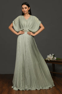 Buy stunning tea green pleated gown online in USA with metallic belt. Make a fashion statement on festive occasions and weddings with designer suits, Indian dresses, Anarkali suits, palazzo suits, designer gowns, sharara suits from Pure Elegance Indian fashion store in USA.-full view