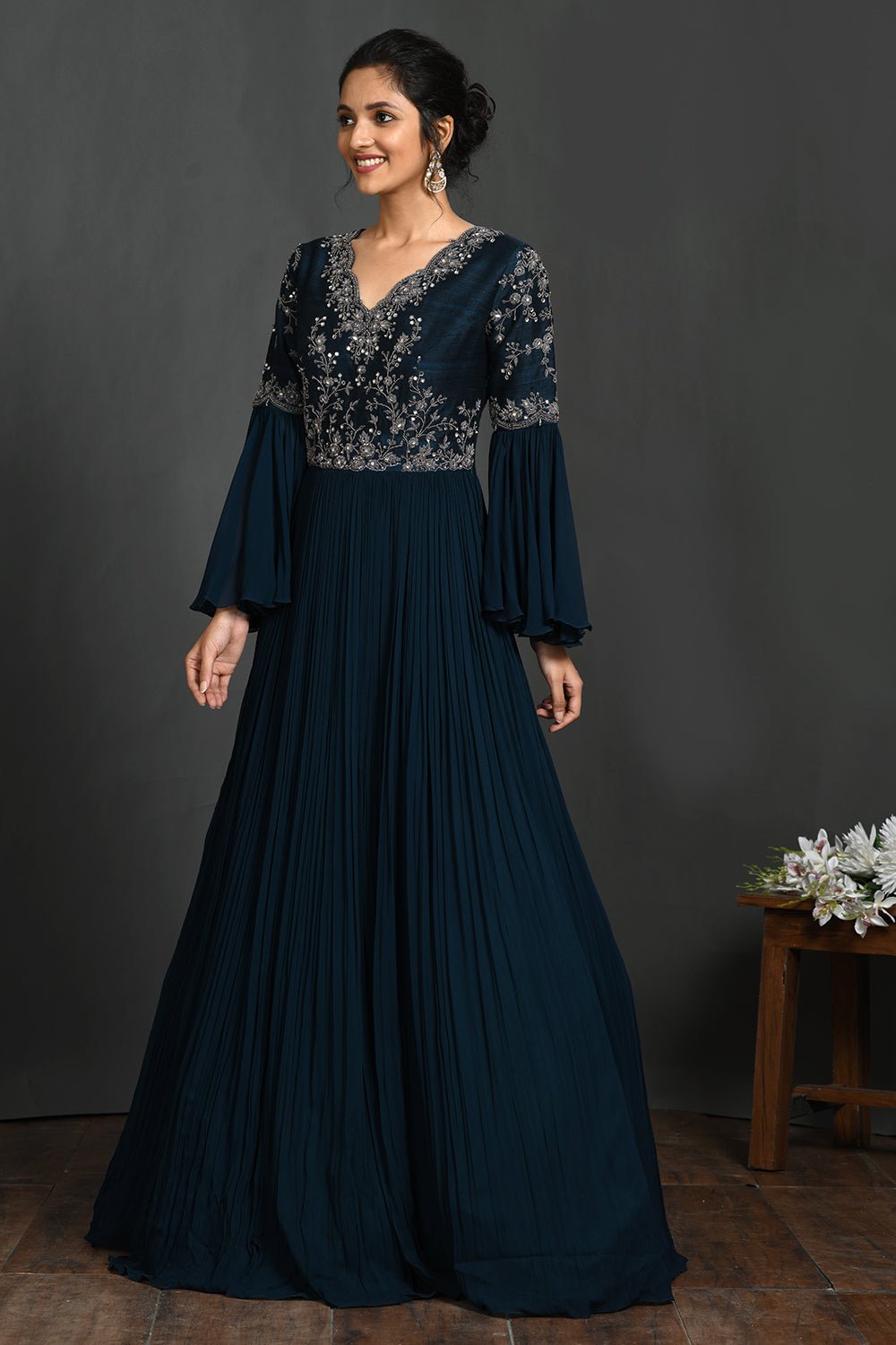 Shop stunning teal blue embroidered fit and flare gown online in USA  Make a fashion statement on festive occasions and weddings with designer suits, Indian dresses, Anarkali suits, palazzo suits, designer gowns, sharara suits from Pure Elegance Indian fashion store in USA.-left